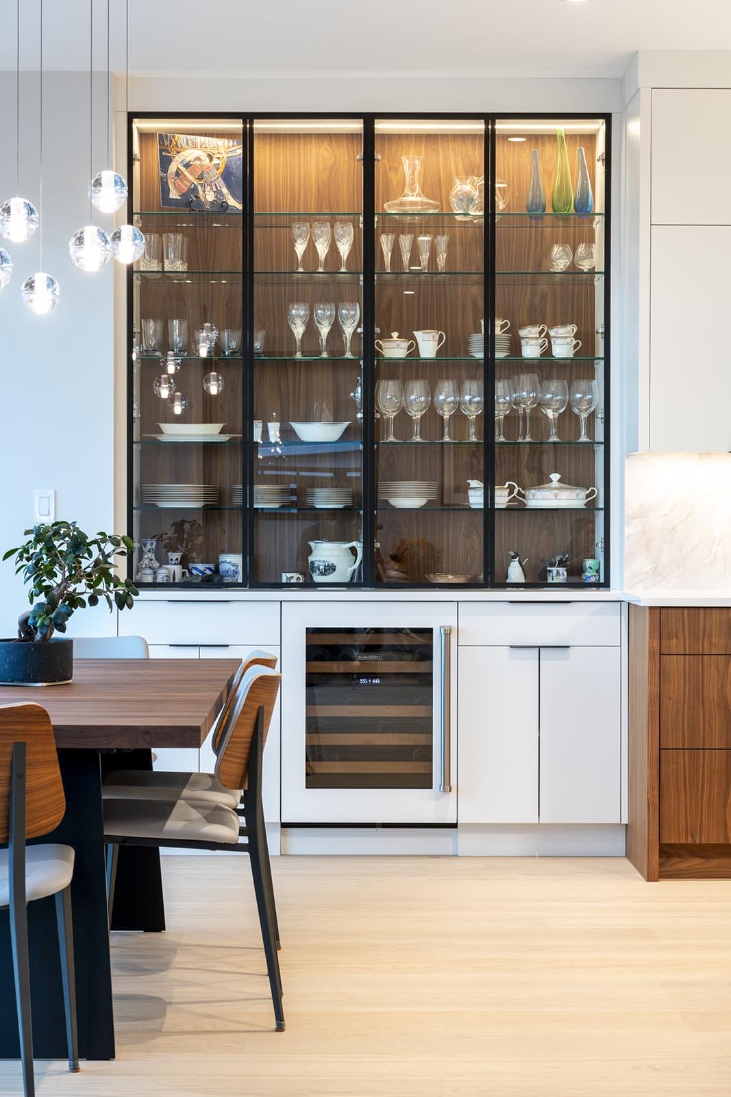 custom home dining room with built in china cabinet