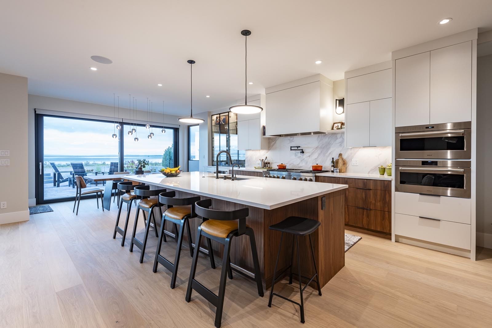 custom home dining room with seaside view